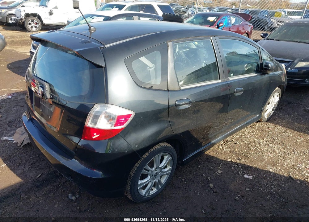 2009 HONDA FIT SPORT VIN: JHMGE88489S003718