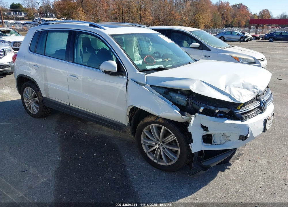 2015 VOLKSWAGEN TIGUAN SE VIN: WVGBV7AX4FW561611