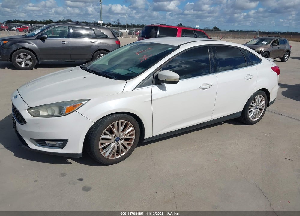 2016 FORD FOCUS TITANIUM VIN: 1FADP3J28GL395171