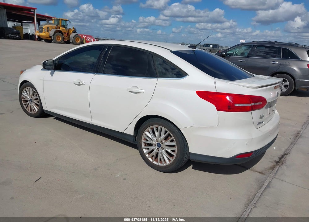 2016 FORD FOCUS TITANIUM VIN: 1FADP3J28GL395171