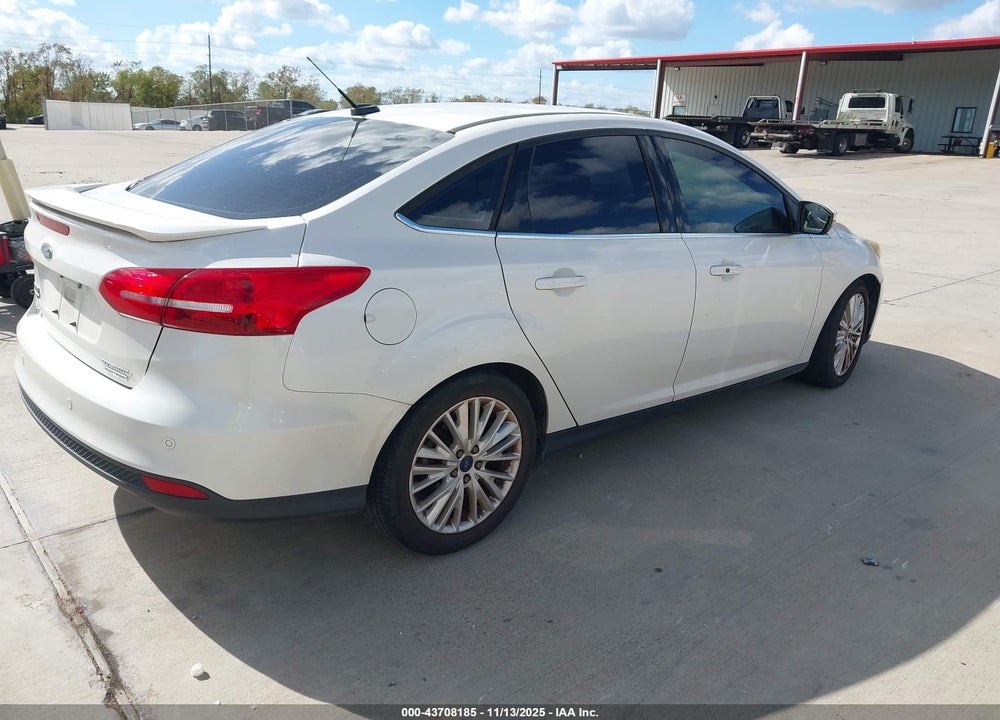 2016 FORD FOCUS TITANIUM VIN: 1FADP3J28GL395171