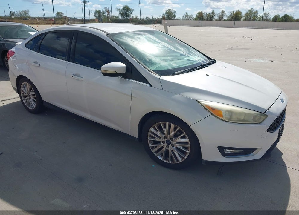 2016 FORD FOCUS TITANIUM VIN: 1FADP3J28GL395171