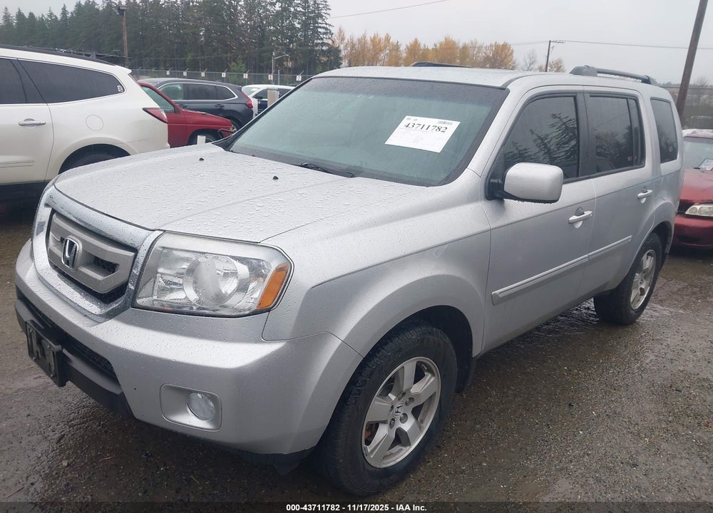 2011 HONDA PILOT EX-L VIN: 5FNYF4H59BB077673