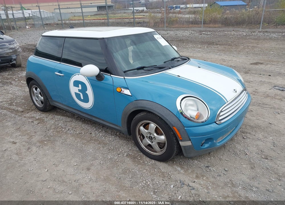2009 MINI COOPER VIN: WMWMF33549TW78591