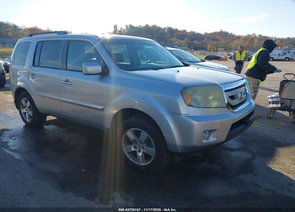 2011 HONDA PILOT EX-L VIN: 5FNYF4H59BB010264
