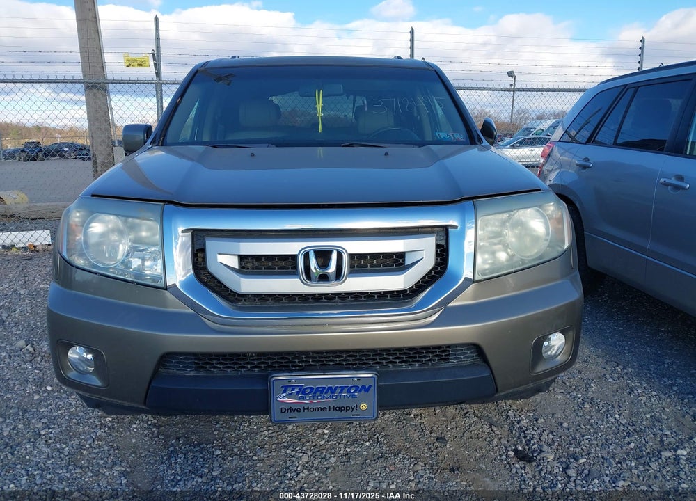 2011 HONDA PILOT EX-L VIN: 5FNYF4H61BB050394