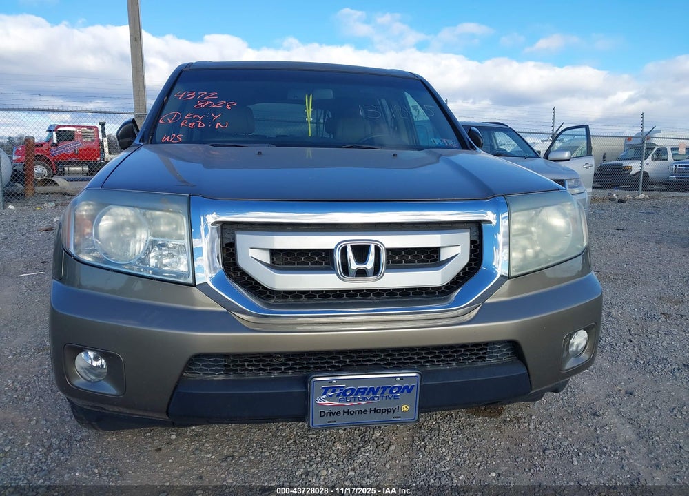 2011 HONDA PILOT EX-L VIN: 5FNYF4H61BB050394