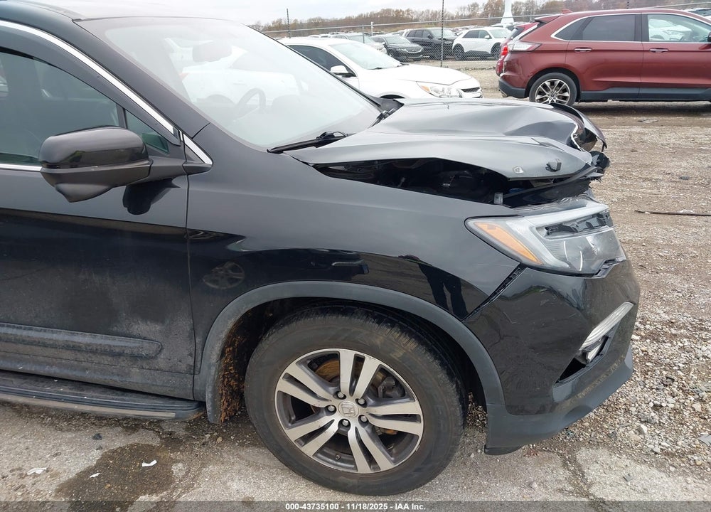 2018 HONDA PILOT EX-L VIN: 5FNYF6H77JB009464