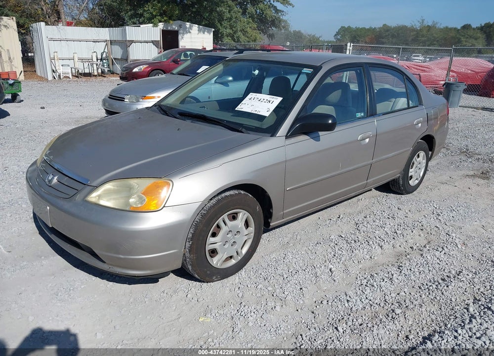 2002 HONDA CIVIC LX VIN: 1HGES165X2L047709