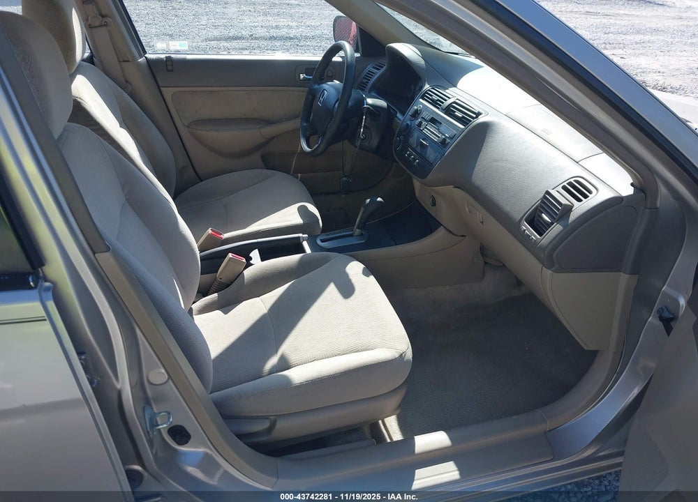 2002 HONDA CIVIC LX VIN: 1HGES165X2L047709