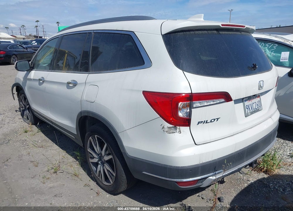 2021 HONDA PILOT 2WD TOURING 8 PASSENGER VIN: 5FNYF5H91MB010304