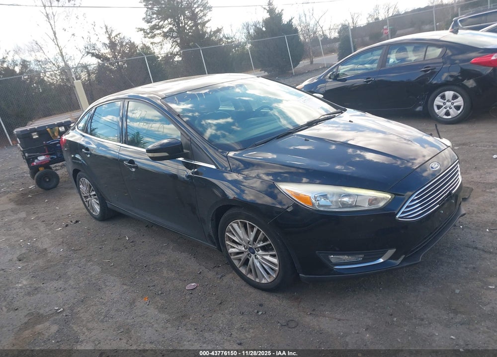 2017 FORD FOCUS TITANIUM VIN: 1FADP3J20HL287340