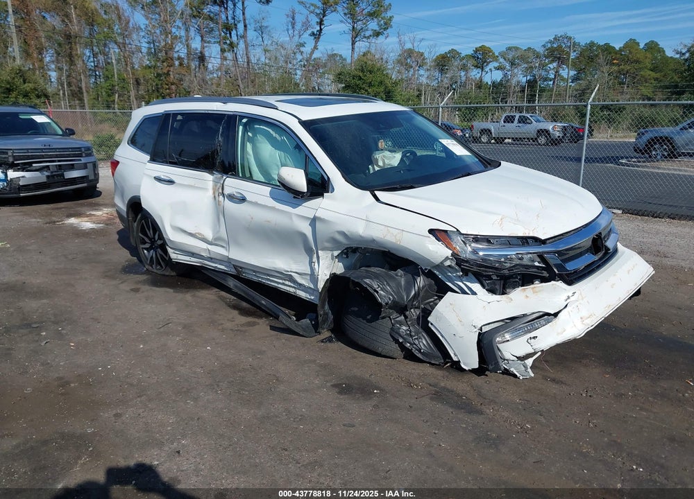2022 HONDA PILOT 2WD TOURING 7 PASSENGER VIN: 5FNYF5H62NB031606