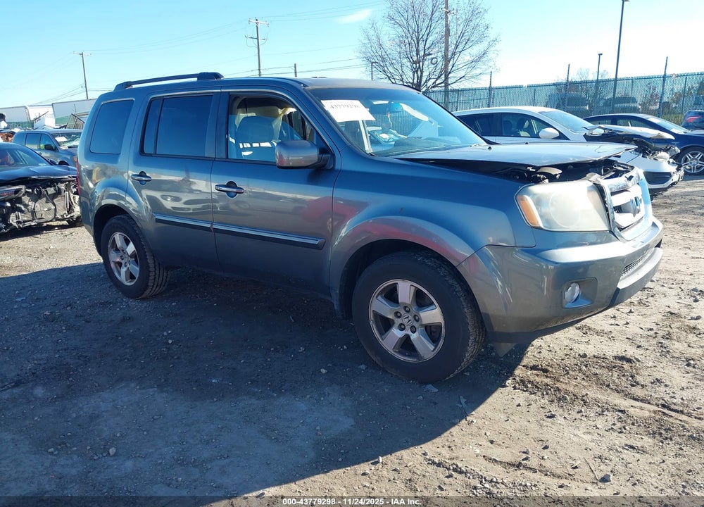 2011 HONDA PILOT EX-L VIN: 5FNYF4H77BB061232