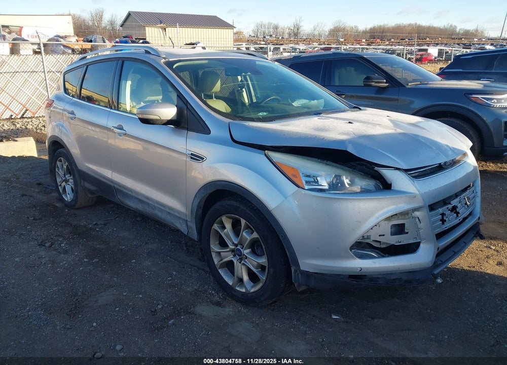2016 FORD ESCAPE TITANIUM VIN: 1FMCU0JX9GUC65902