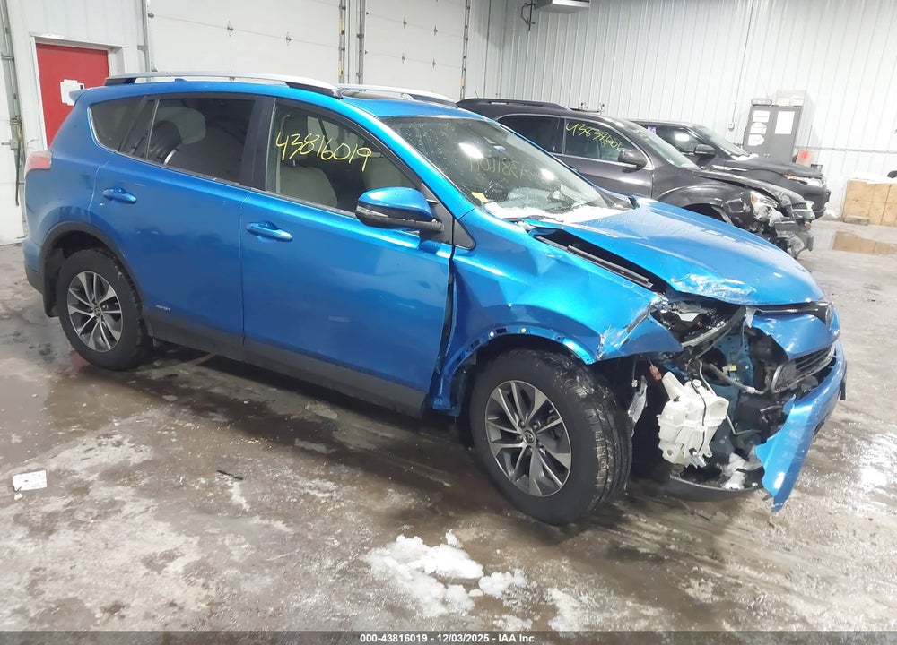 2018 TOYOTA RAV4 HYBRID XLE VIN: JTMRJREV7JD234658