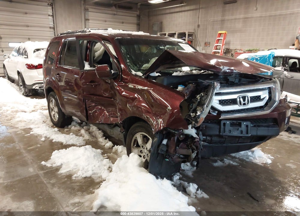 2011 HONDA PILOT EX-L VIN: 5FNYF4H52BB031103
