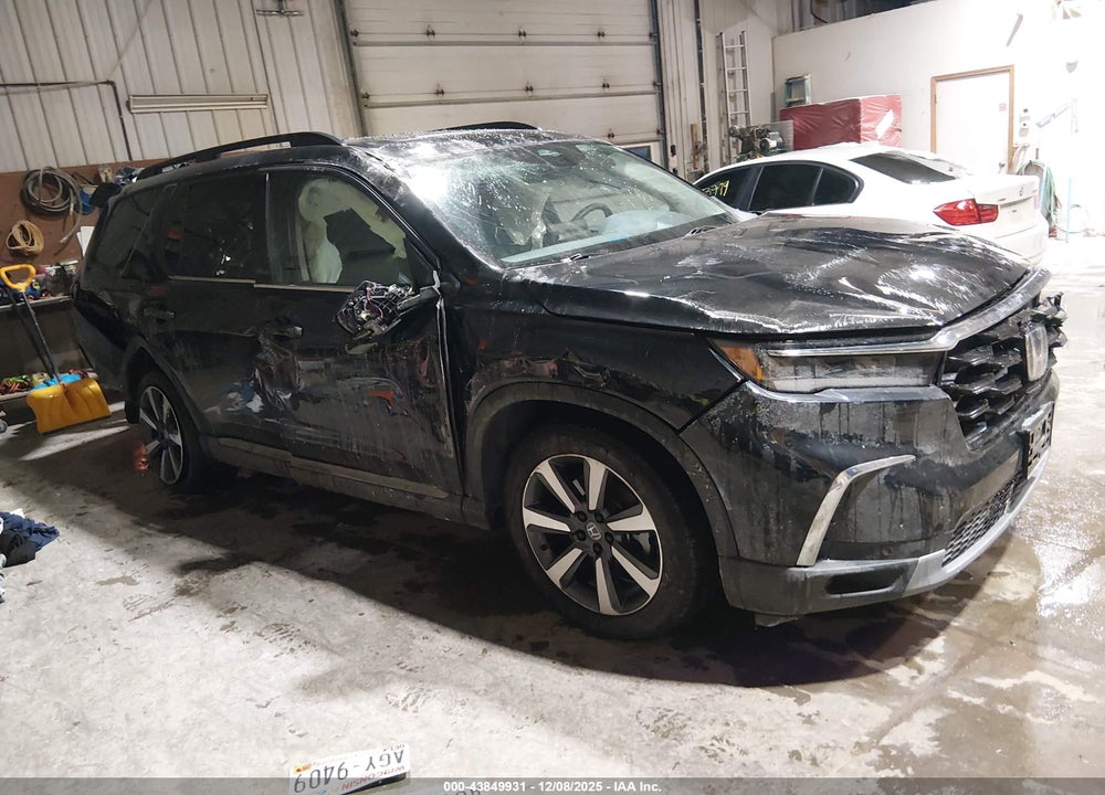 2025 HONDA PILOT TOURING VIN: 5FNYG1H77SB003410