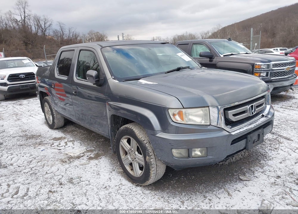 2011 HONDA RIDGELINE RTL VIN: 5FPYK1F51BB010439