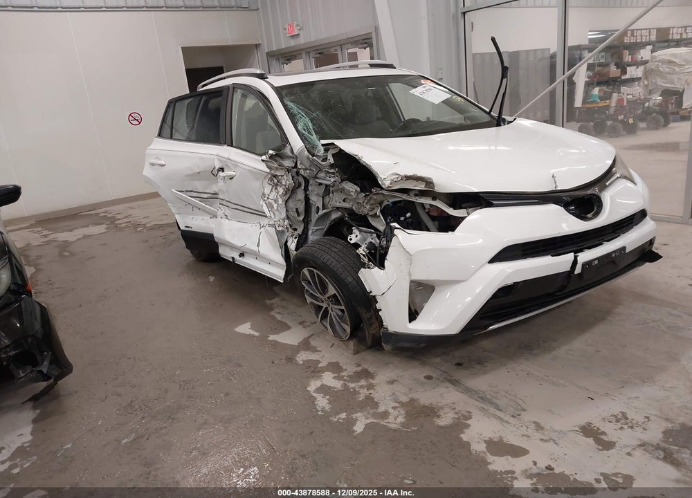 2016 TOYOTA RAV4 HYBRID XLE VIN: JTMRJREV4GD042381