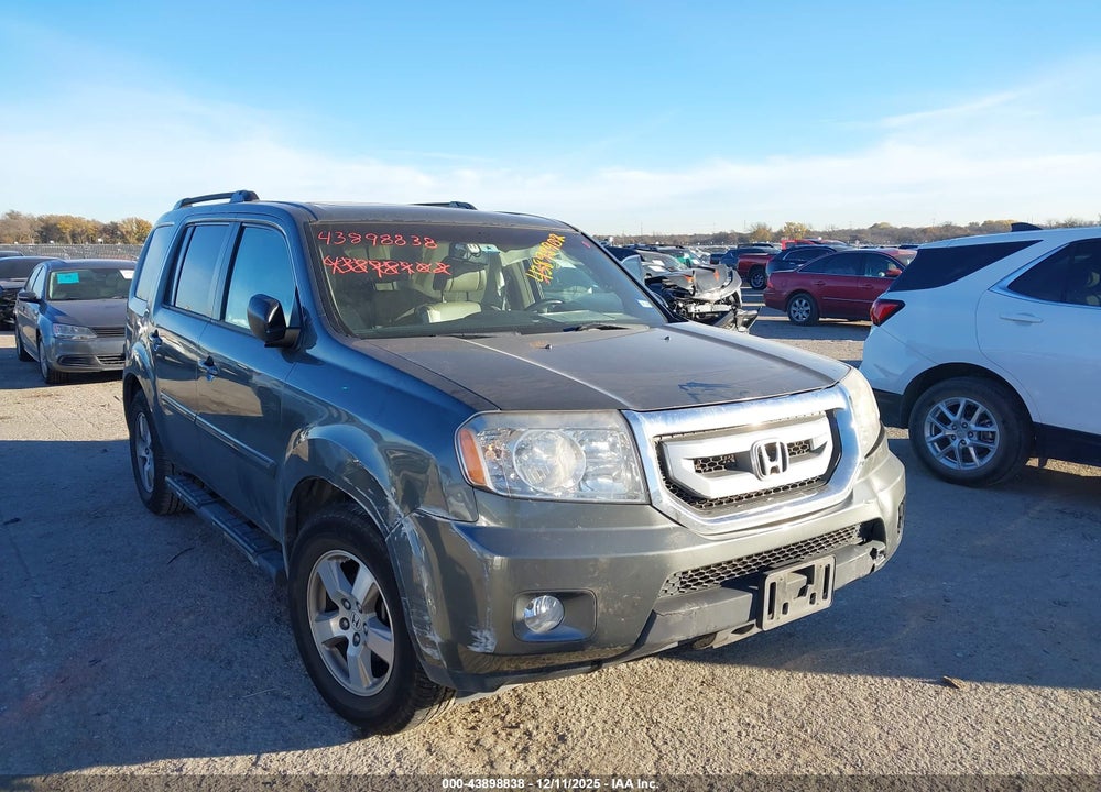 2009 HONDA PILOT EX-L VIN: 5FNYF385X9B001951