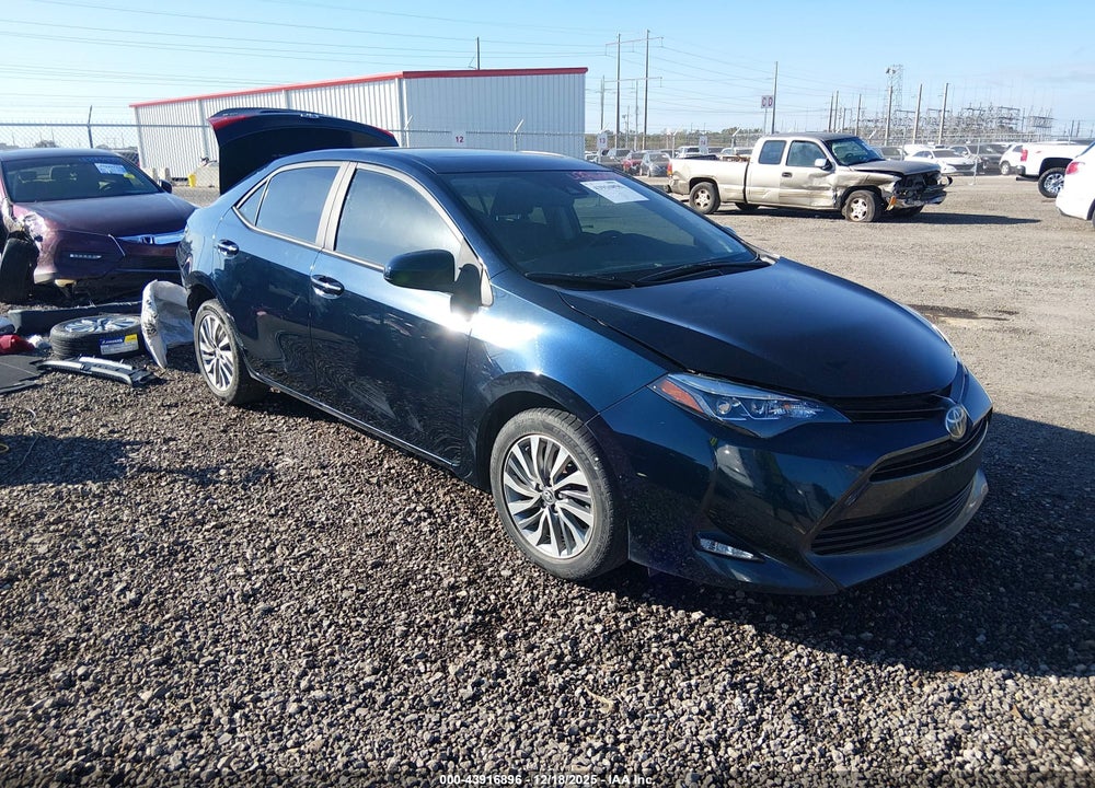 2018 TOYOTA COROLLA XLE VIN: 5YFBURHE6JP765979