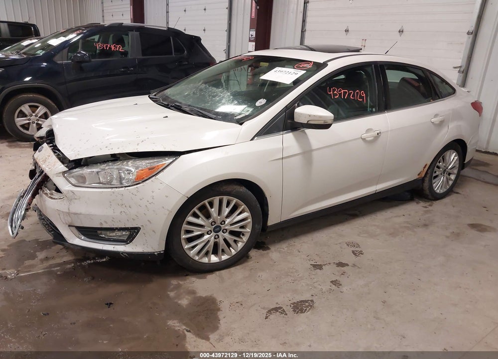 2017 FORD FOCUS TITANIUM VIN: 1FADP3J20HL200682