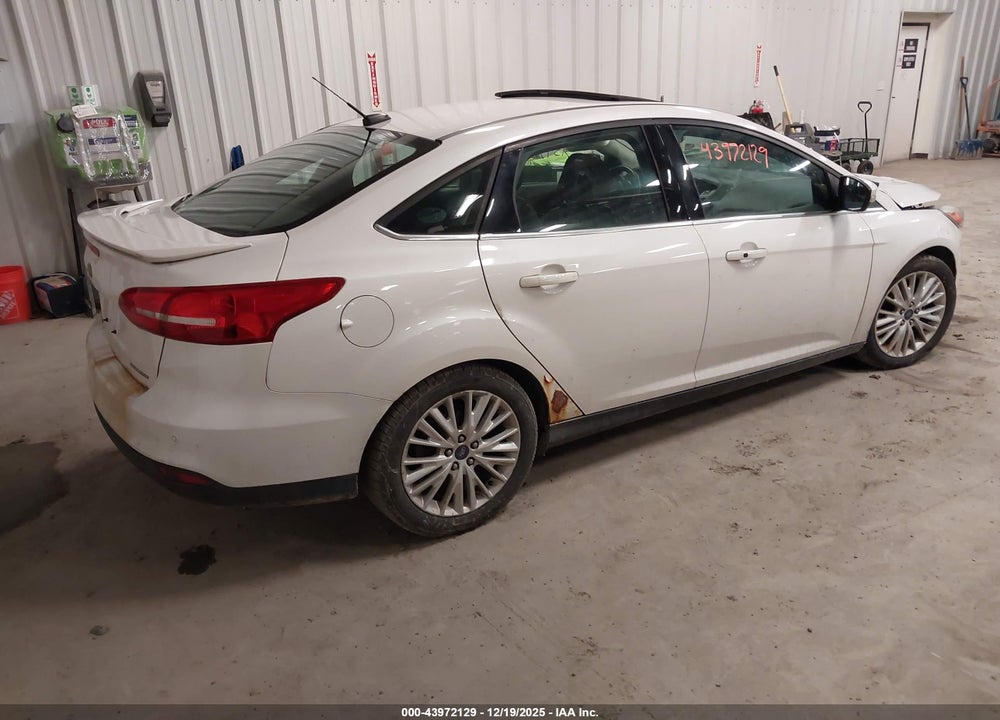 2017 FORD FOCUS TITANIUM VIN: 1FADP3J20HL200682