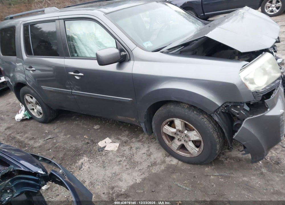 2011 HONDA PILOT EX-L VIN: 5FNYF4H52BB055188