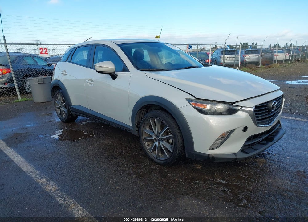 2017 MAZDA CX-3 TOURING VIN: JM1DKFC79H0154676
