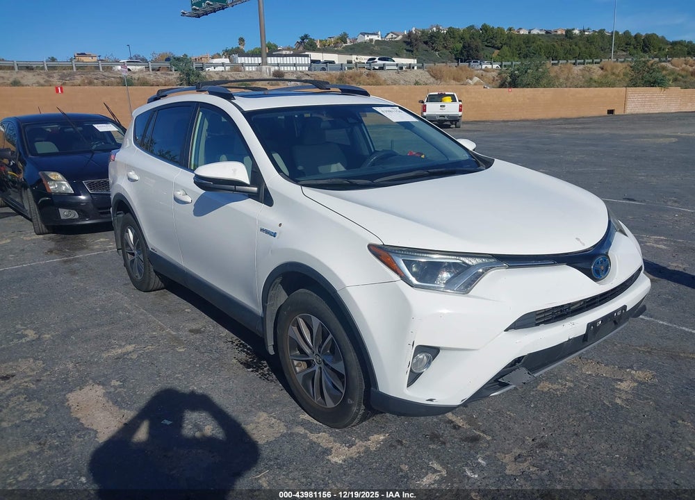 2018 TOYOTA RAV4 HYBRID XLE VIN: JTMRJREV5JD248395