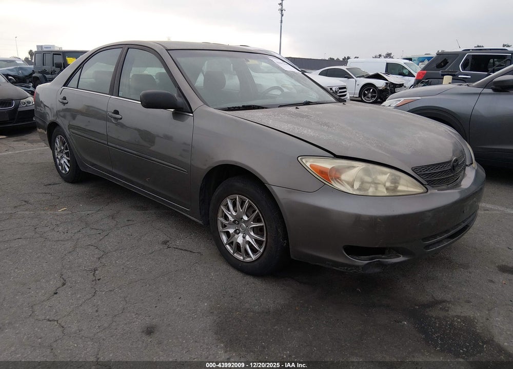 2002 TOYOTA CAMRY LE VIN: JTDBE32K520097841