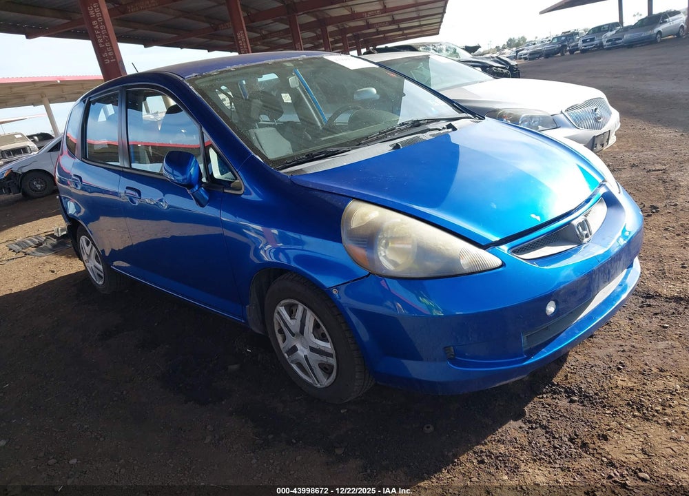 2007 HONDA FIT VIN: JHMGD384X7S035847