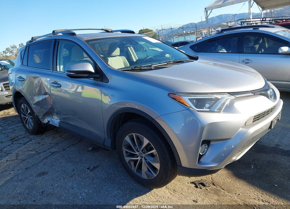 2017 TOYOTA RAV4 HYBRID XLE VIN: JTMRJREVXHD083602