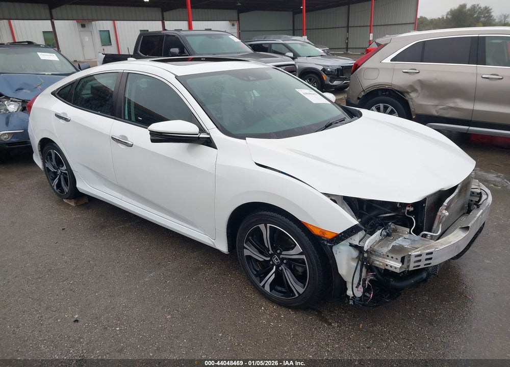 2017 HONDA CIVIC TOURING VIN: 19XFC1F94HE014063