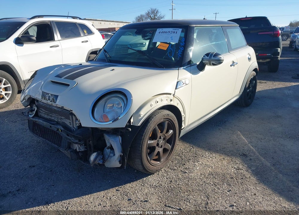 2009 MINI COOPER S VIN: WMWMF73589TW85437