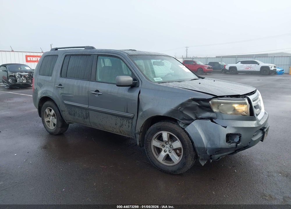 2011 HONDA PILOT EX-L VIN: 5FNYF4H64BB074270