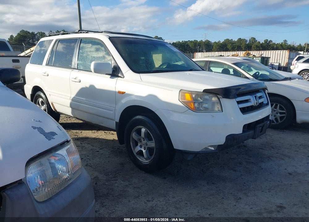 2007 HONDA PILOT EX-L VIN: 5FNYF28547B010040