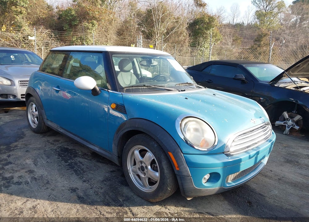 2009 MINI COOPER VIN: WMWMF33549TU70890