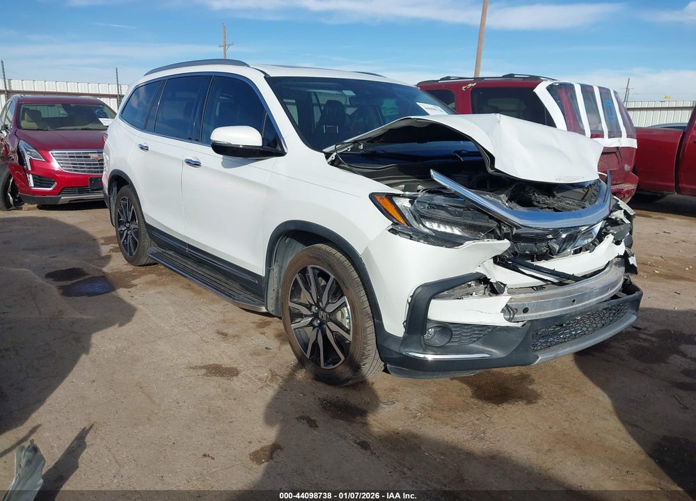 2021 HONDA PILOT 2WD TOURING 8 PASSENGER VIN: 5FNYF5H97MB023526