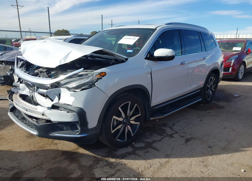 2021 HONDA PILOT 2WD TOURING 8 PASSENGER VIN: 5FNYF5H97MB023526