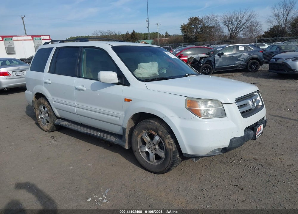 2007 HONDA PILOT EX-L VIN: 5FNYF18527B030622