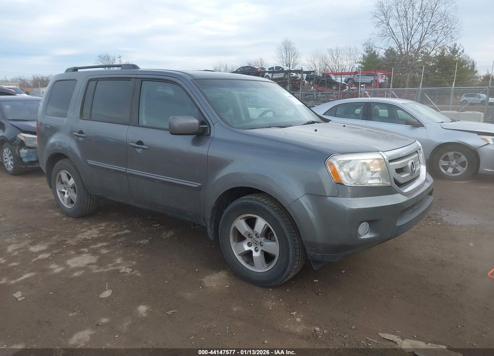 2011 HONDA PILOT EX-L VIN: 5FNYF4H56BB021674