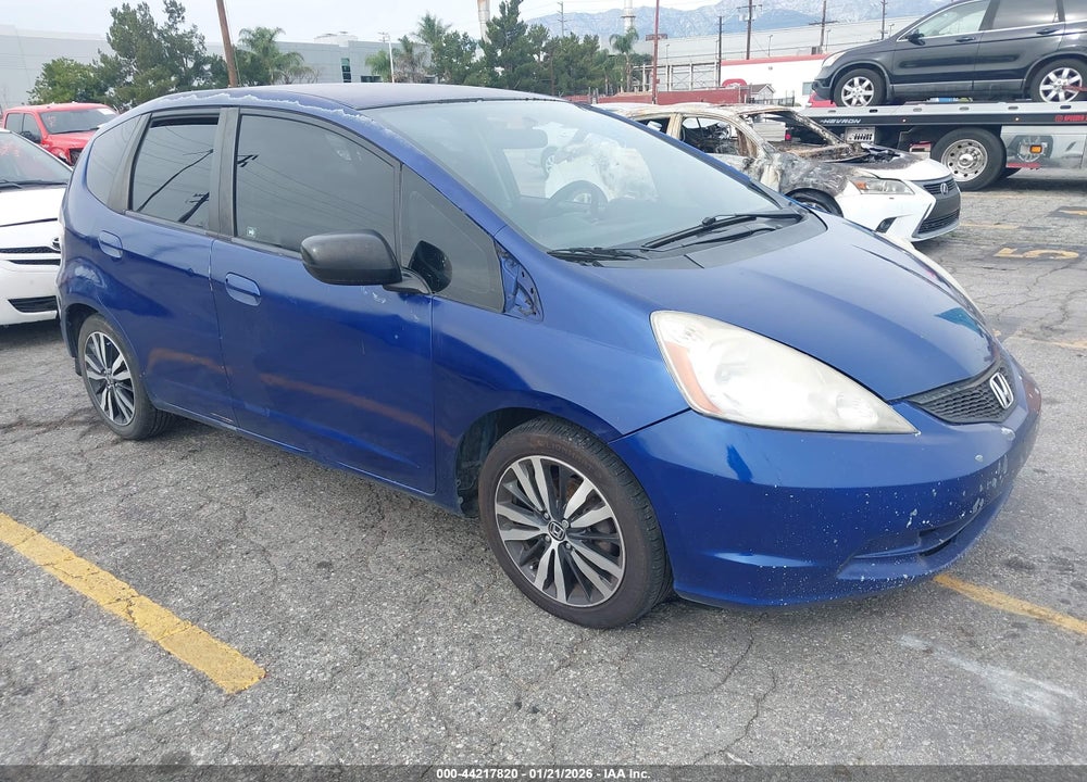2009 HONDA FIT VIN: JHMGE87289S039490