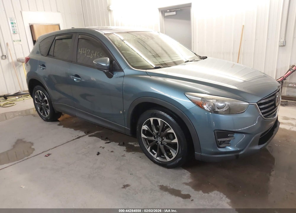 2016 MAZDA CX-5 GRAND TOURING VIN: JM3KE4DY9G0797299