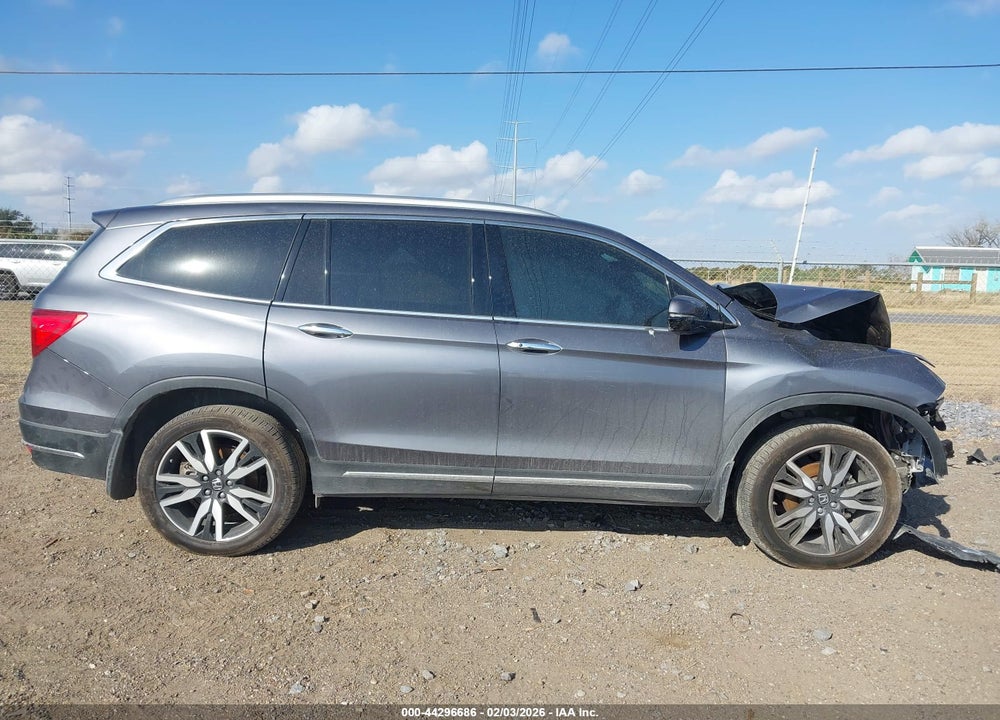 2022 HONDA PILOT 2WD TOURING 7 PASSENGER VIN: 5FNYF5H67NB029723
