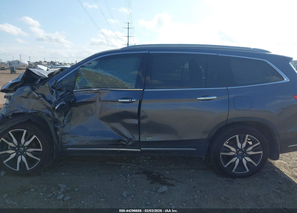 2022 HONDA PILOT 2WD TOURING 7 PASSENGER VIN: 5FNYF5H67NB029723