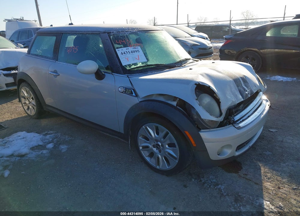 2010 MINI COOPER VIN: WMWMF3C56ATU76839