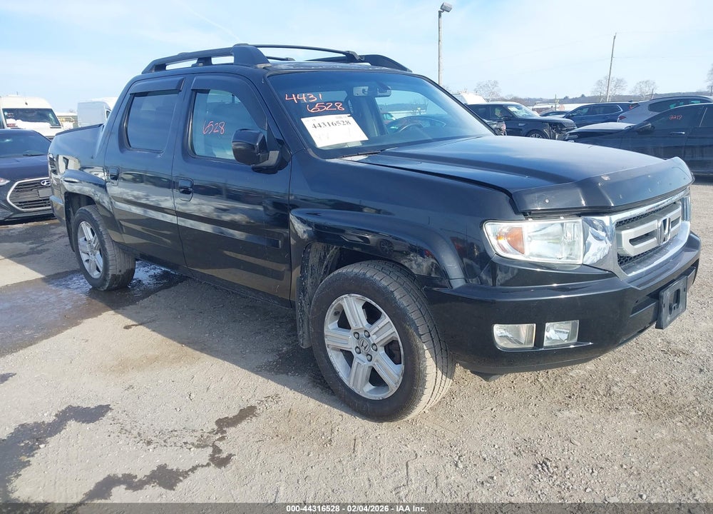 2011 HONDA RIDGELINE RTL VIN: 5FPYK1F59BB001441