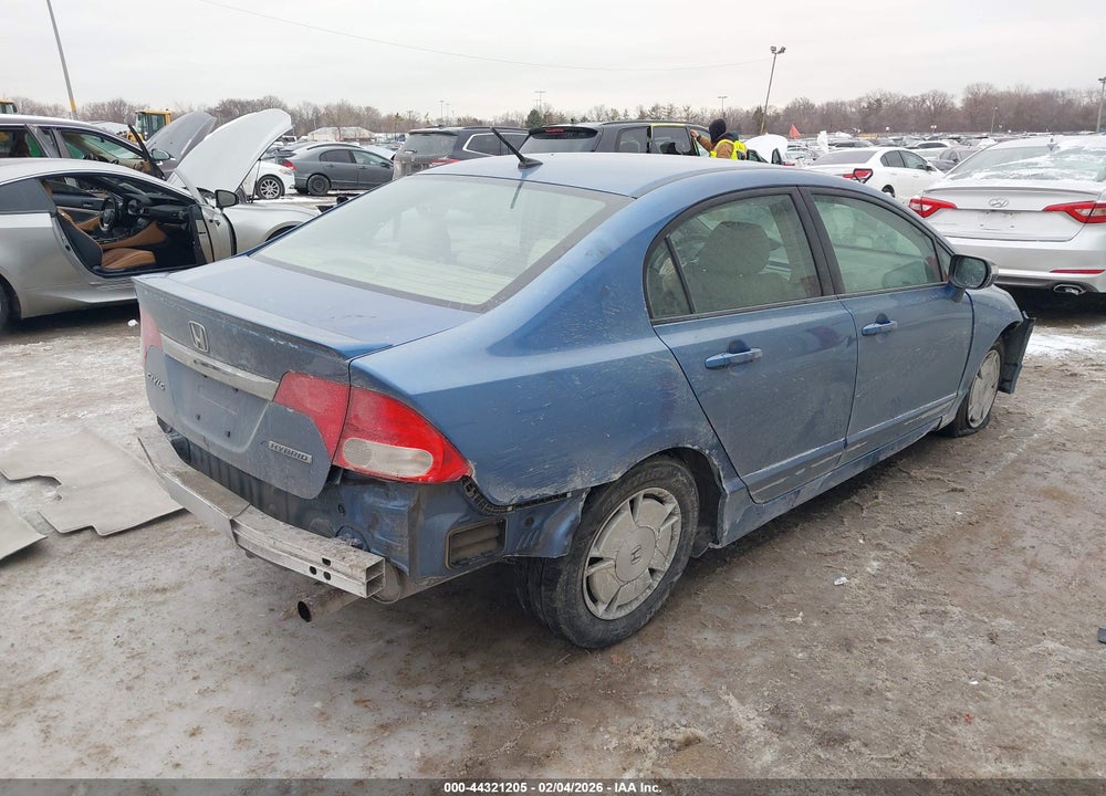 2010 HONDA CIVIC HYBRID VIN: JHMFA3F23AS007112
